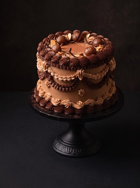 Dark chocolate sponge, chestnut mascarpone mousse, sweet chestnut center and toasted almond chocolate crunch.